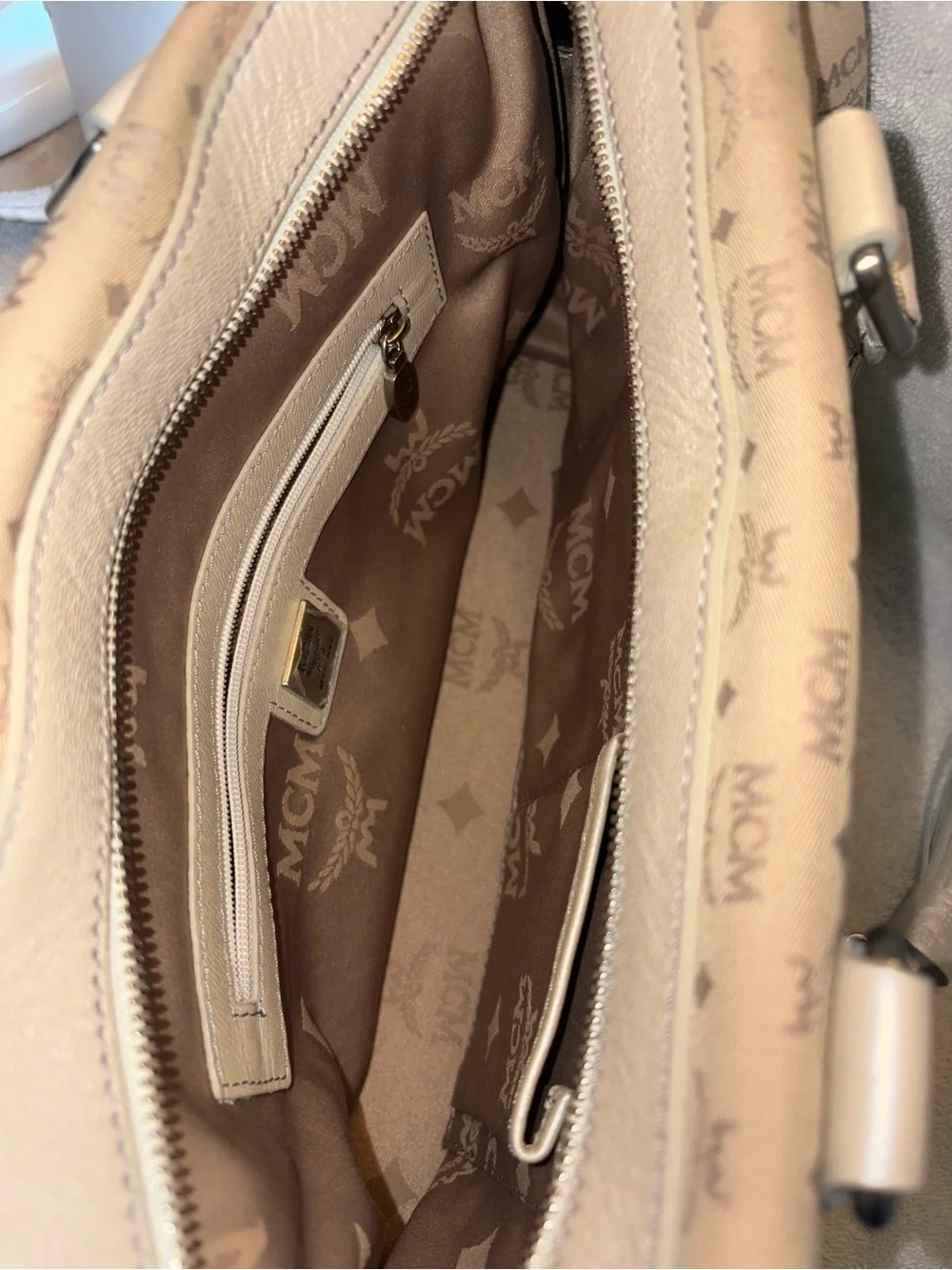 MCM cognac logo